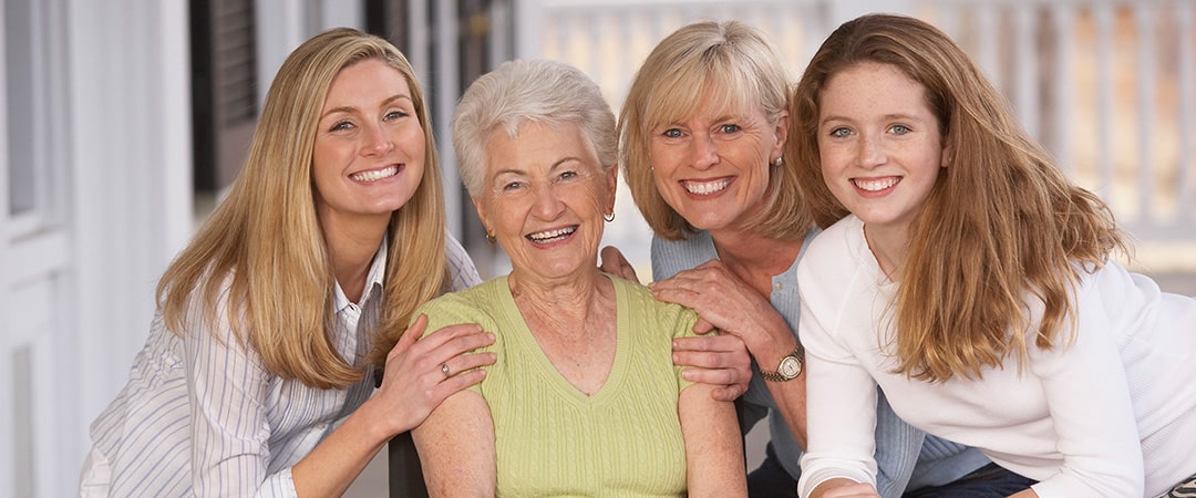 4 generations of women gathered around the matriarch
